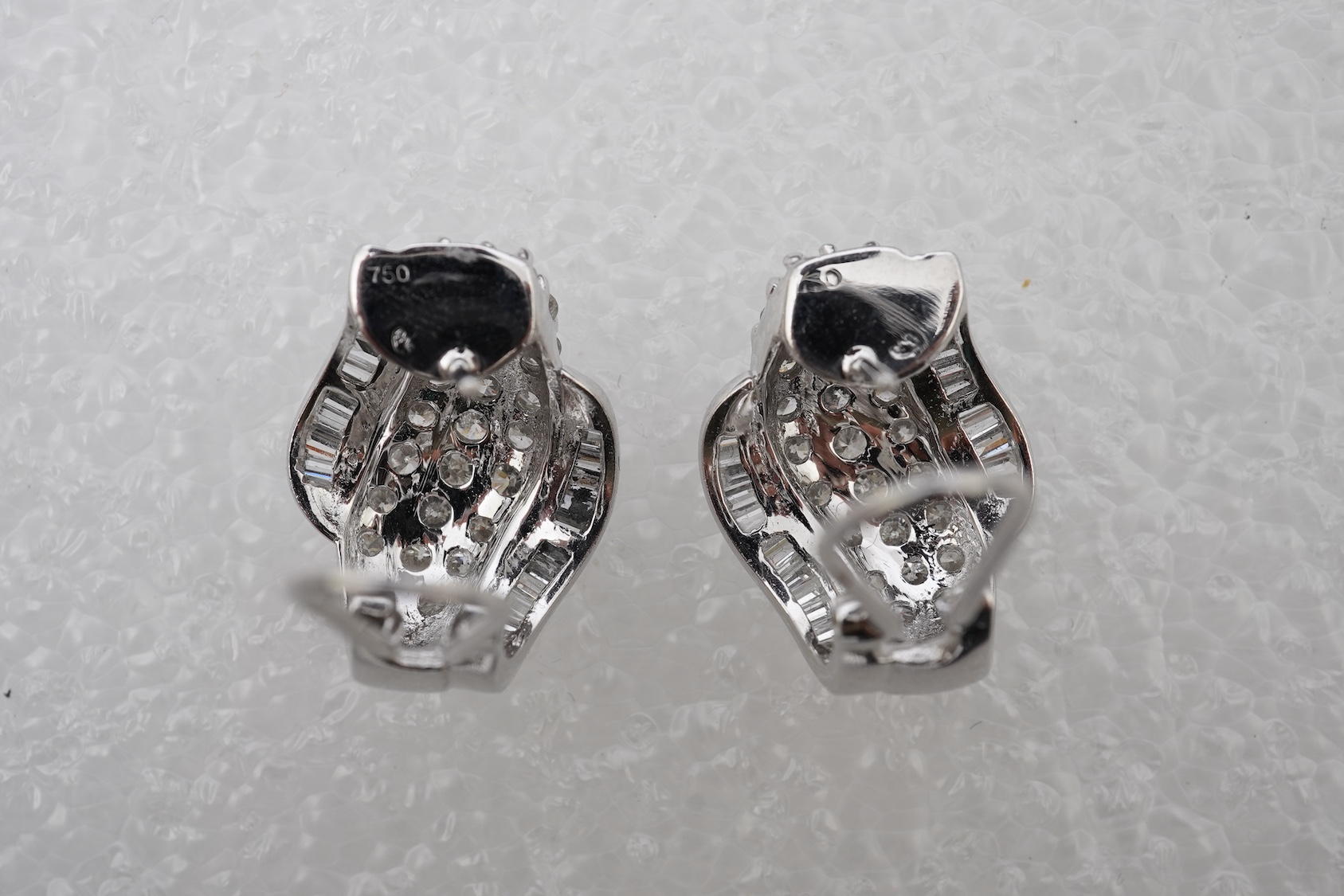 A pair of diamond earrings